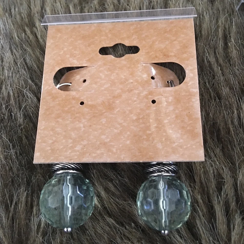 Faceted light blue glass silver tone lever backs